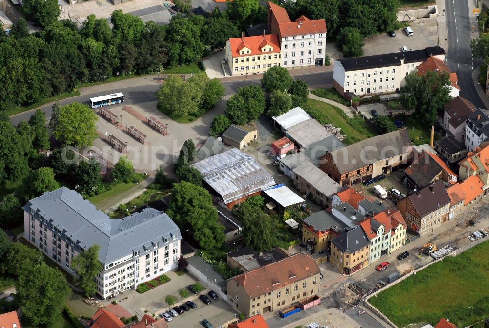 Apolda from the bird's eye view: In Bernhardstrasse of Apolda in Thuringia is the nursing home per vita - At the old bell foundry. Behind the nursing home is the bus station of the city Apolda with the customer center