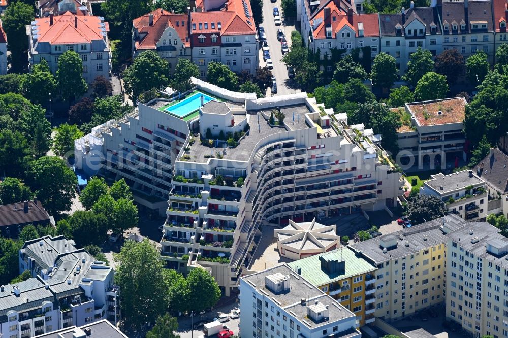 München from above - High-rise building Fuchsbau in Munich in the state Bavaria. The distinctive pyramid-shaped terraced apartment building resembles the Pharaoh house, but is smaller