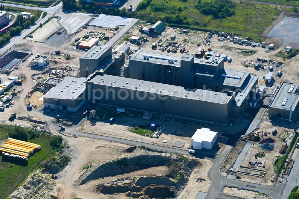 Wolfen from above - Refinery systems and pipe systems on the factory premises of the chemical producer AMG Lithium GmbH for the production of lithium hydroxide in battery quality on the Insulation Material Road - Liebigstrasse in Wolfen in the state Saxony-Anhalt, Germany