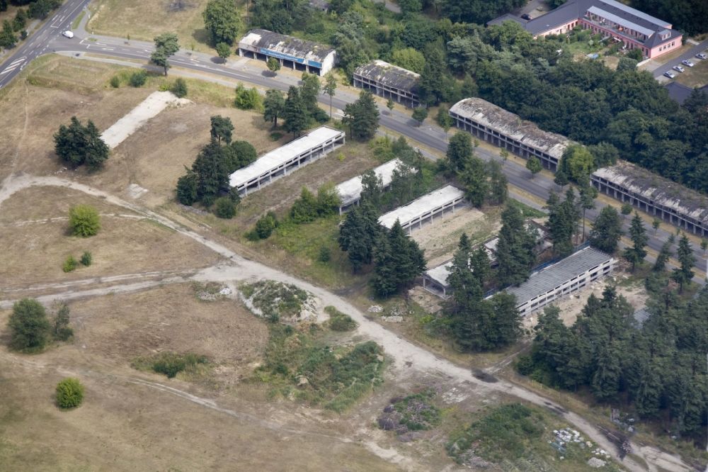 Aerial image Wustermark OT Elstal - The peripheral development of the former Olympic Village in Elstal in Brandenburg. The original edge development is largely destroyed. Former garage areas are designed as exclusive residences