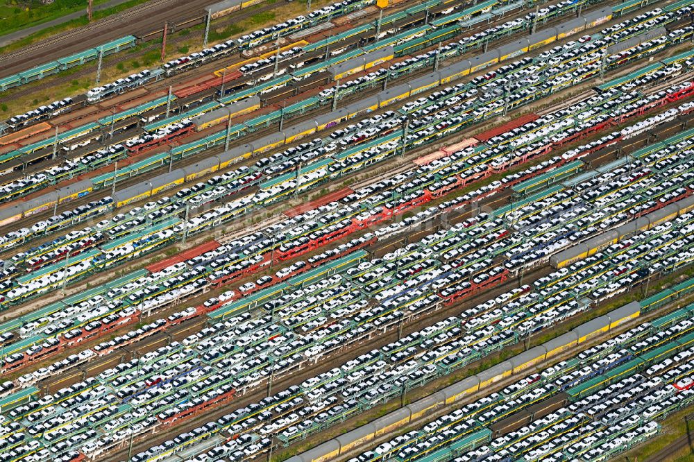 Bremen from above - Marshalling yard and freight station with car and new car transport on street Marienwerderstrasse in Bremen, Germany