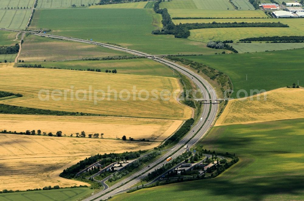 Sömmerda from above - Is the resting place Thuringian basin between the motorway exits Soemmerda-East and South-Soemmerda on the highway BAB71 at Soemmerda in Thuringia. The parking lot for cars and trucks has on legs lanes on each one outhouse