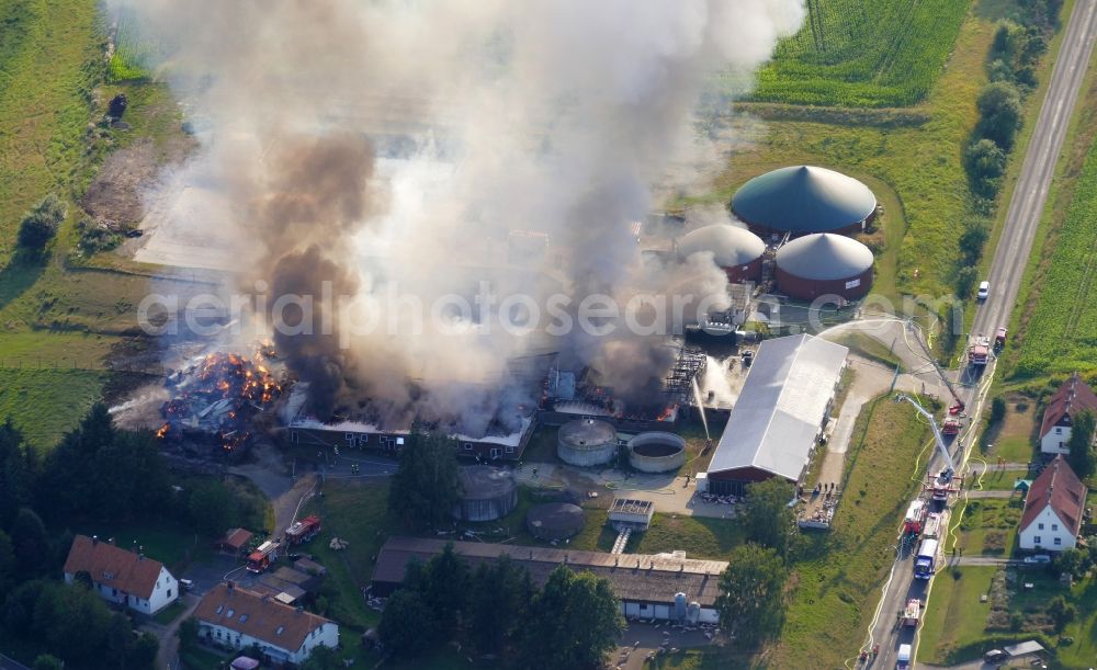 Aerial image Dassel - Smoke and flames during the fire fighting to fire on Experimental property of the University of Goettingen in the district Relliehausen in Dassel in the state Lower Saxony, Germany