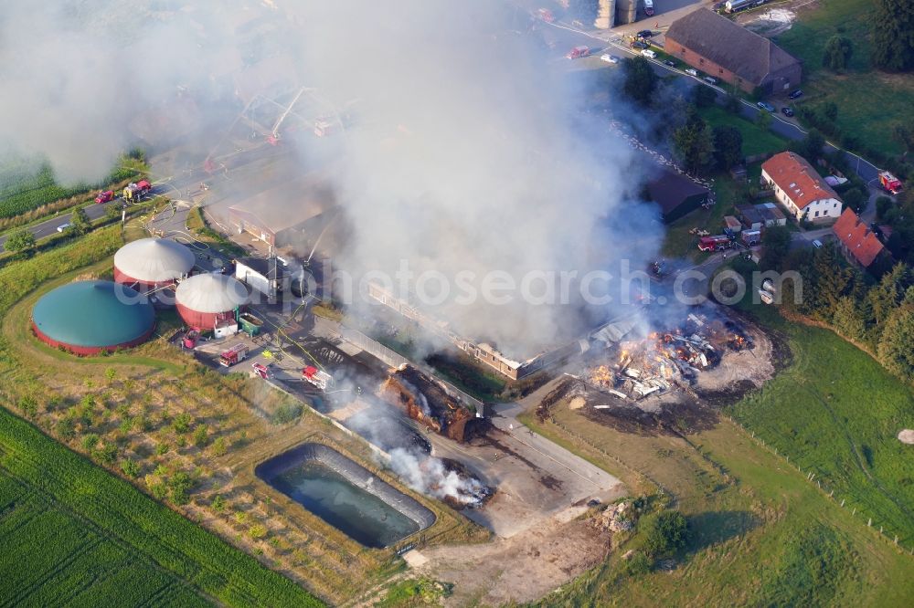 Aerial image Dassel - Smoke and flames during the fire fighting to fire on Experimental property of the University of Goettingen in the district Relliehausen in Dassel in the state Lower Saxony, Germany