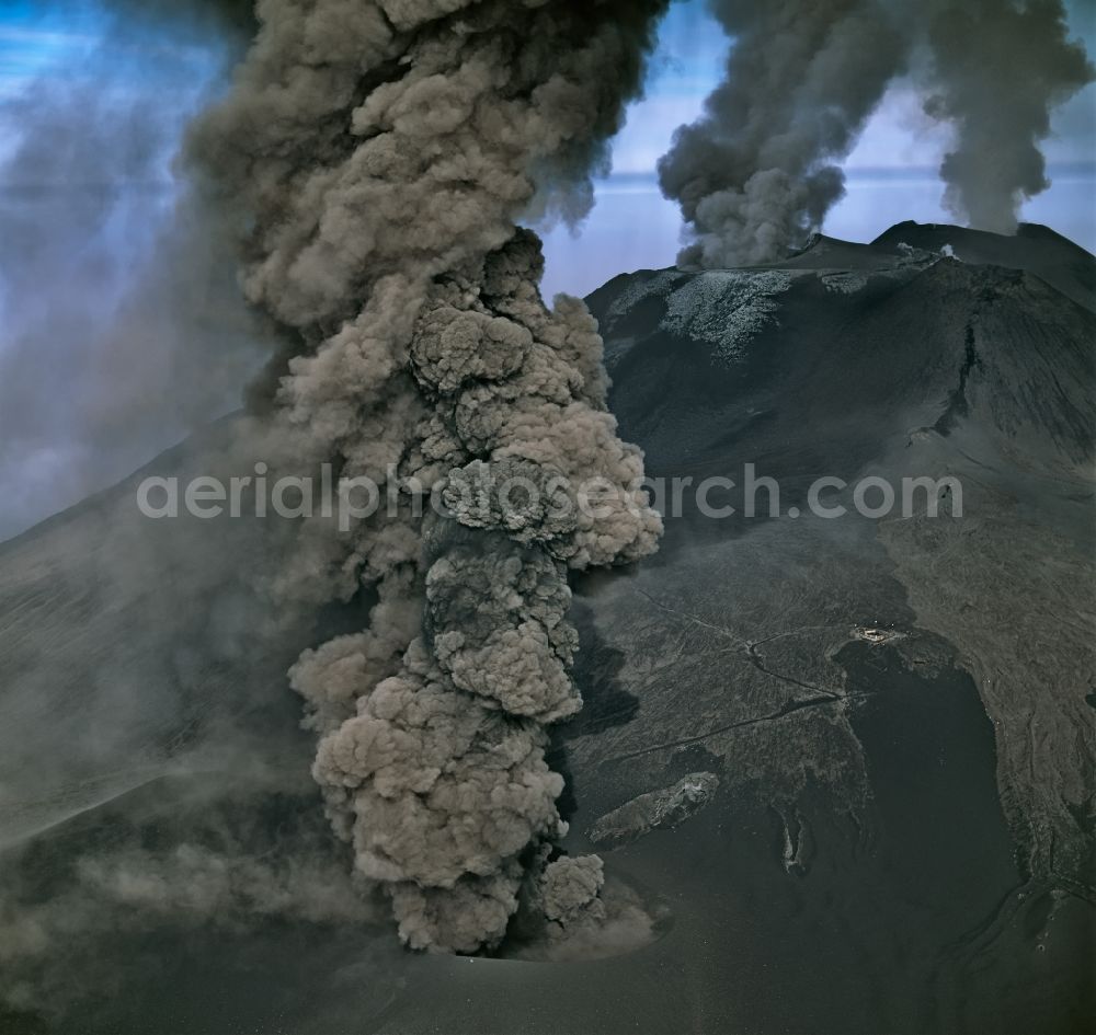 Aerial photograph Sizilien - Black plumes of smoke above the volcano crater with landscape Aetna in Sicilia, Italy