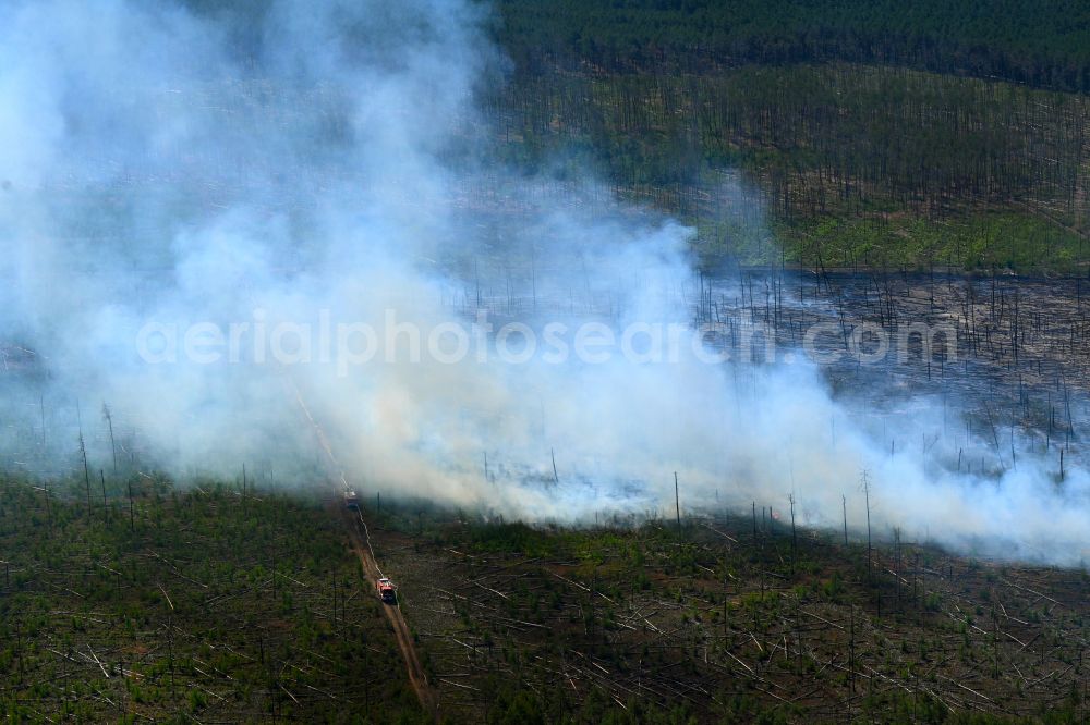 Aerial image Treuenbrietzen - Smoke clouds by the Great Fire - destroyed forest fire tree population in a wooded area - forest terrain in the district Bardenitz in Treuenbrietzen in the state Brandenburg, Germany