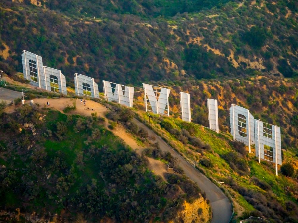 Aerial image Los Angeles - Back view of the landmark and cultural icon Hollywood sign on Mount Lee in Los Angeles in California, USA