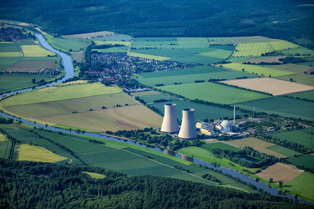 Grohnde from above - Reactor blocks, cooling tower structures and facilities of the nuclear power plant in Grohnde in the state of Lower Saxony, Germany