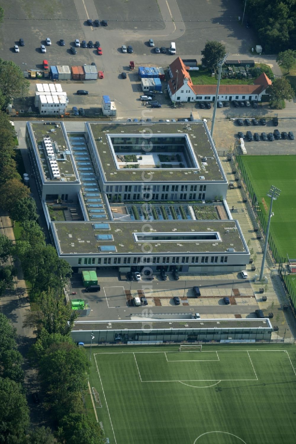 Leipzig from the bird's eye view: Red Bull Academy on the grounds of the RB- training facilities on Cottaweg in Leipzig in the state of Saxony. The academy is located in the new building complex next to football pitches and outdoor facilities