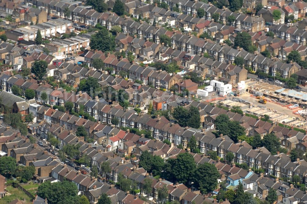 Aerial image London - View of a row of terraced houses with single-family homes between Albert Road and Scott's Road in the district Leyton in London in the county of Greater London in the UK