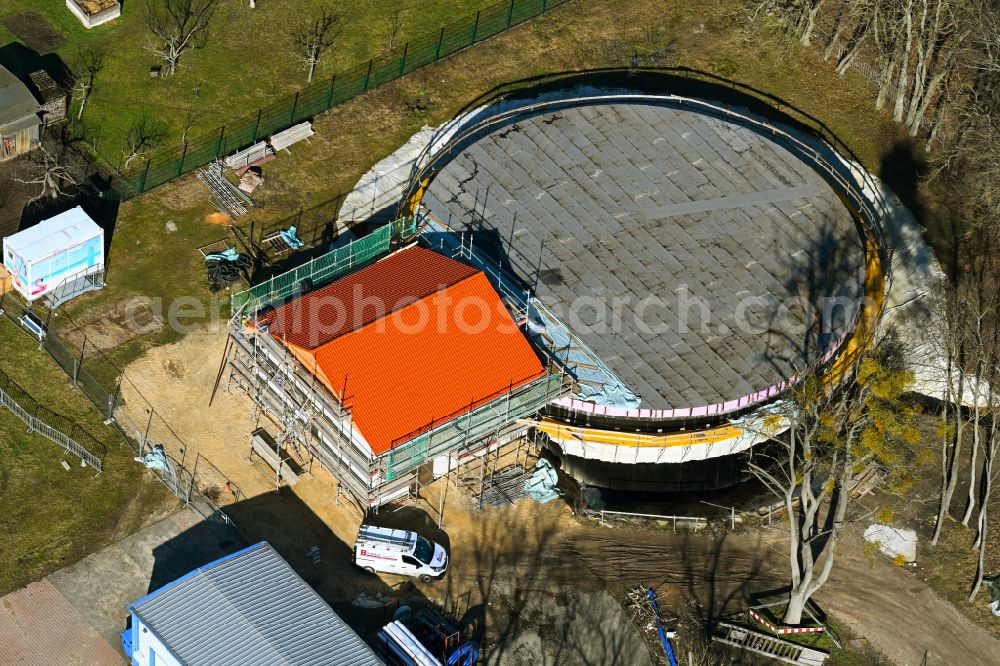 Werneuchen from the bird's eye view: Construction site for the new construction of the retention basin and water storage on street Wesendahler Strasse in Werneuchen in the state Brandenburg, Germany