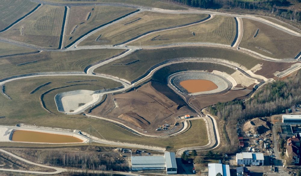 Wackersdorf from the bird's eye view: Renovation, sealing and restoration work on the site of the refurbished landfill Deponie Westfeld in Wackersdorf in the state Bavaria, Germany