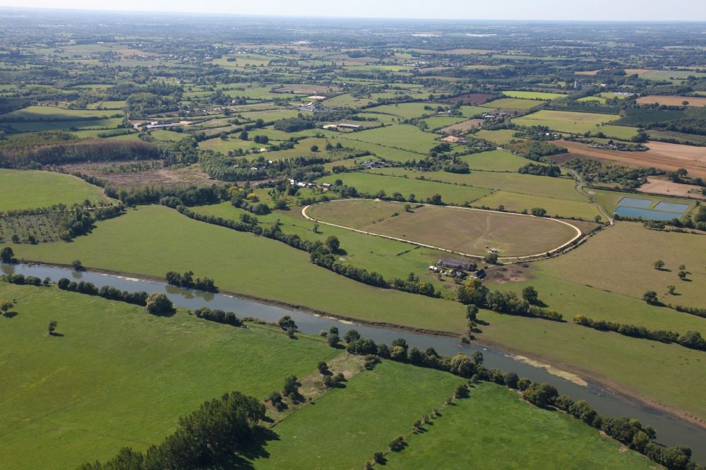 Aerial image Cheffes - Racetrack racecourse - trotting in Cheffes in Pays de la Loire, France.In the foreground the river Sarthe
