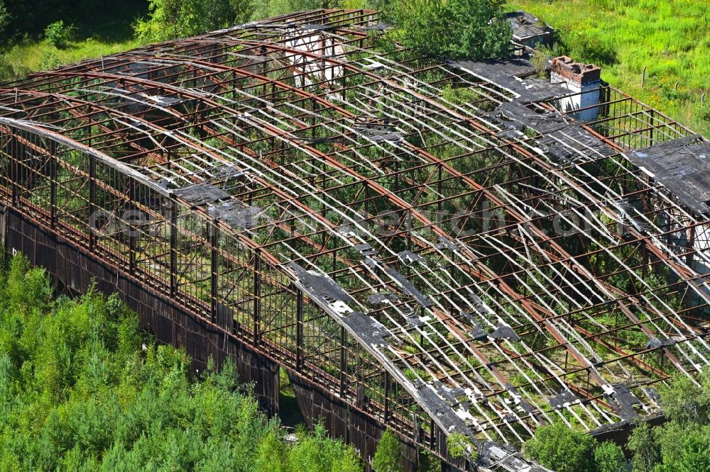 Aerial photograph Oberkrämer - Remains of hangar aircraft hangars at the former Schoenwalde airfield in the district of Boetzow in Oberkraemer in the state of Brandenburg, Germany