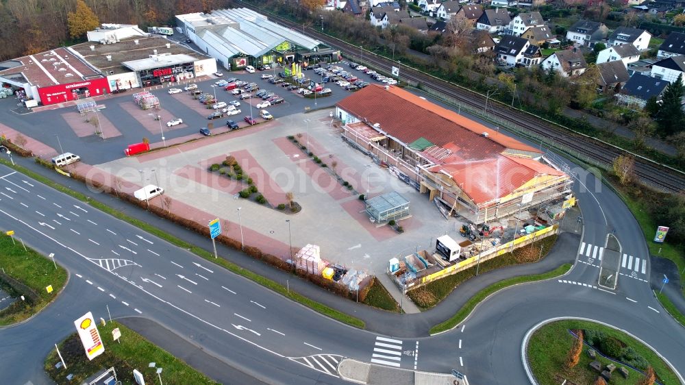 Aerial image Hennef (Sieg) - Revitalization and expansion construction at the building complex of the shopping center LIDL on Emil-Langen-Strasse in Hennef (Sieg) in the state North Rhine-Westphalia, Germany