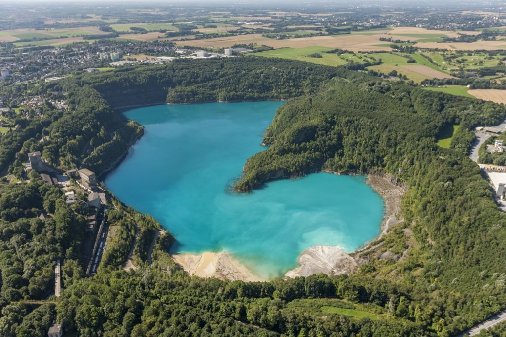 Wülfrath from above - View of the Rheinkalk quarry plant Fan dersbach in Wülfrath in the federal state North Rhine-Westphalia NRW. The quarry is the biggest Lime stone factory in Europe and operated by the Rheinkalk GmbH
