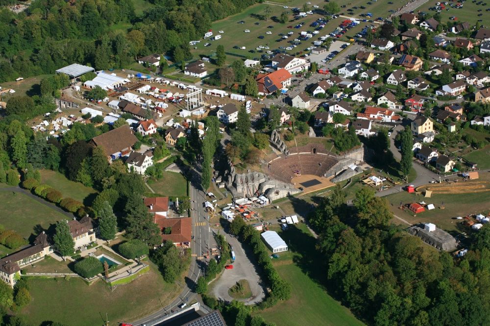 Augst from above - Historic Roman Theatre and area of the annual Roman Festival in Kaiseraugst in the canton Basel-Landschaft, Switzerland