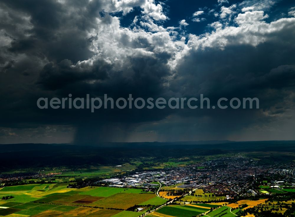 Aerial image Rottenburg - The city of Rottenburg am Neckar in the state of Baden-Württemberg. The city is located in the county of Tübingen. The overview shows the surrounding area of the city and stormy weather