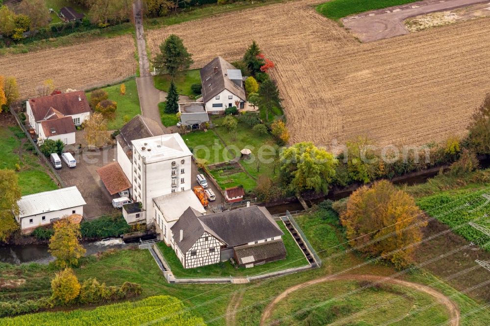 Aerial photograph Schwanau - Historic mill on a farm homestead on the edge of cultivated fields in Schwanau in the state Baden-Wurttemberg, Germany