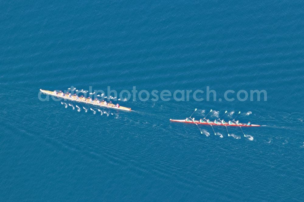 Aerial image Pöcking - Rowing boats at the rowing regatta Roseninsel-8er on the Starnberger See in front of Possenhofen in the state of Bavaria. The event is annually organized by the Munich Rowing and Sailing Association