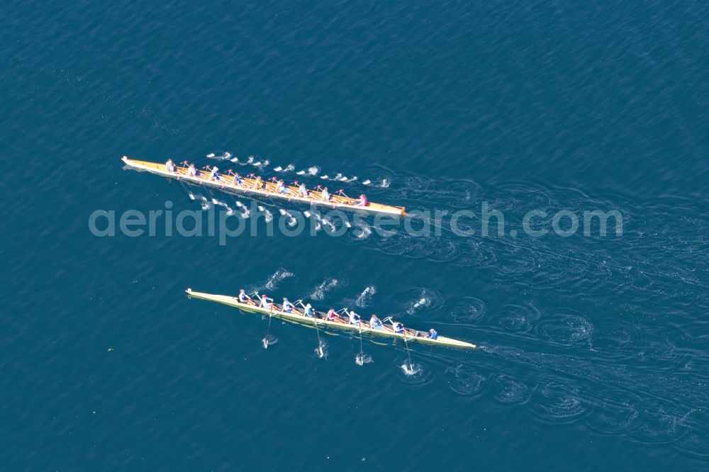 Pöcking from above - Rowing boats at the rowing regatta Roseninsel-8er on the Starnberger See in front of Possenhofen in the state of Bavaria. The event is annually organized by the Munich Rowing and Sailing Association
