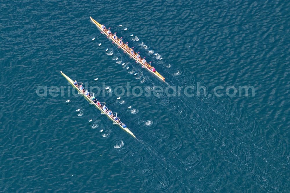 Aerial image Pöcking - Rowing boats at the rowing regatta Roseninsel-8er on the Starnberger See in front of Possenhofen in the state of Bavaria. The event is annually organized by the Munich Rowing and Sailing Association