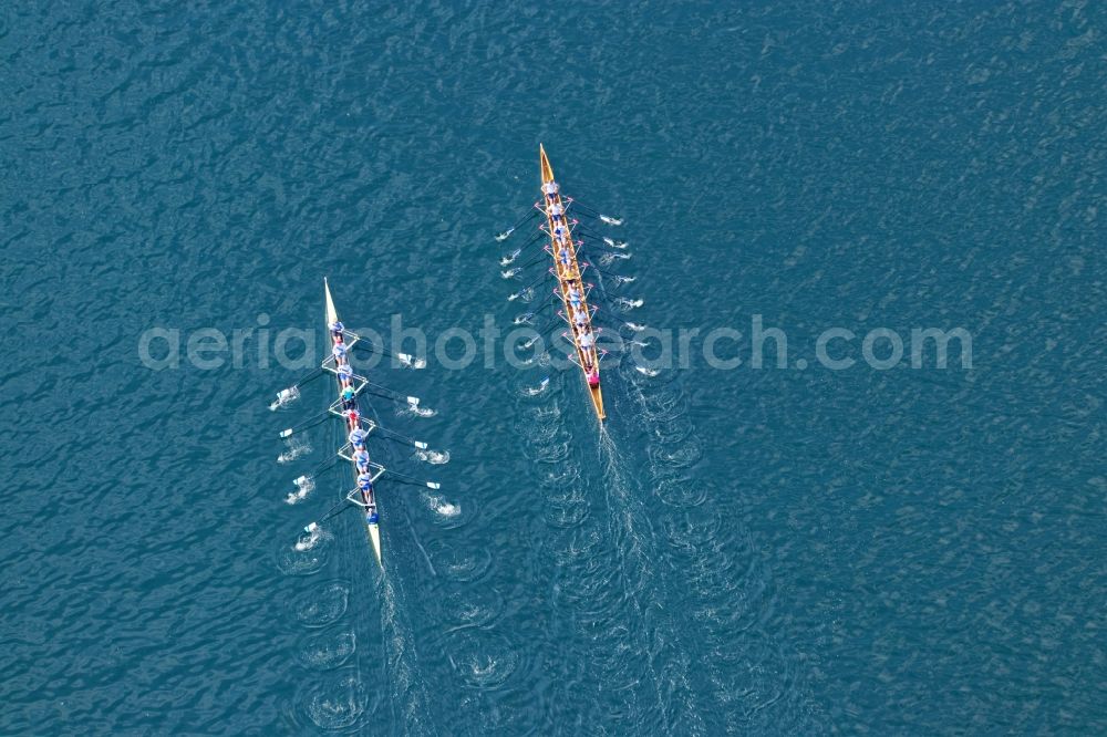 Pöcking from above - Rowing boats at the rowing regatta Roseninsel-8er on the Starnberger See in front of Possenhofen in the state of Bavaria. The event is annually organized by the Munich Rowing and Sailing Association