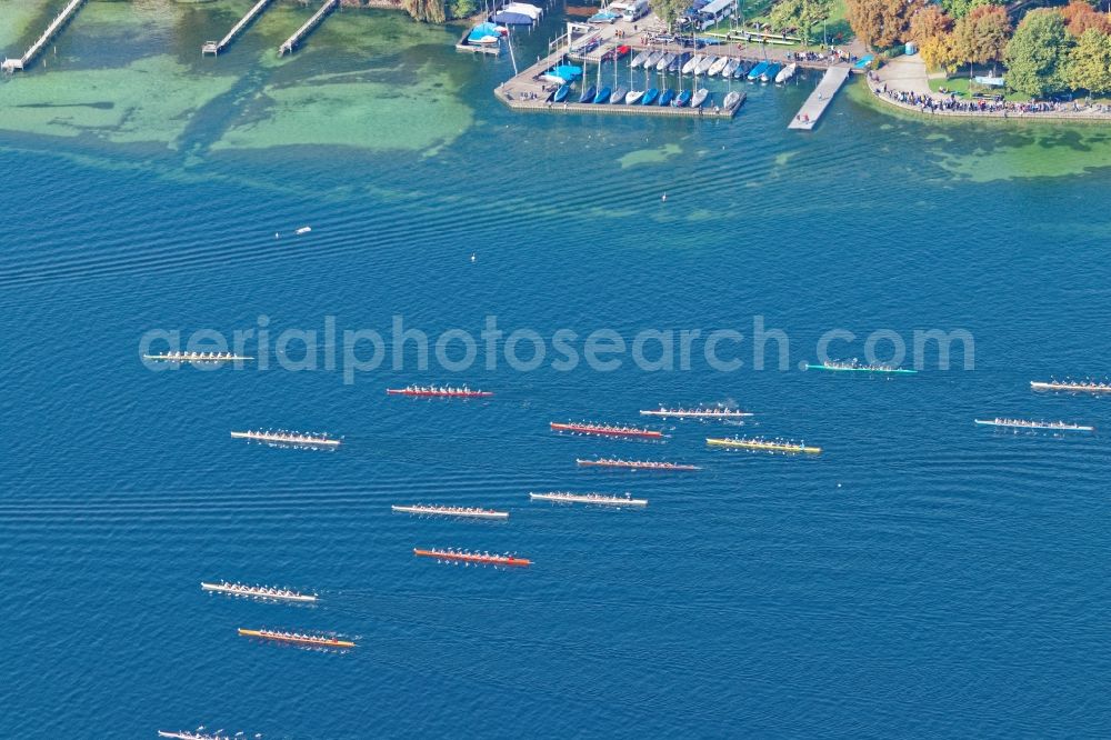 Aerial photograph Starnberg - Rowing boats at the rowing regatta Roseninsel-8er on the Starnberger See in front of Starnberg in the state of Bavaria. The event is annually organized by the Munich Rowing and Sailing Association