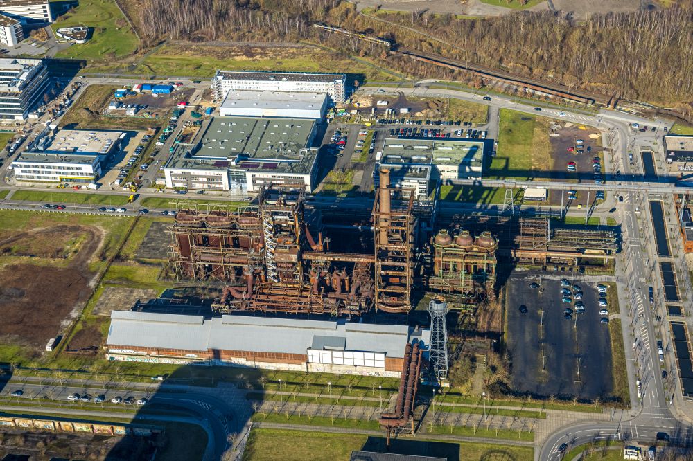 Dortmund from the bird's eye view: Ruins of the former steel mill next to the company headquartersof Themico and Albonair GmbH in Dortmund in the state North Rhine-Westphalia