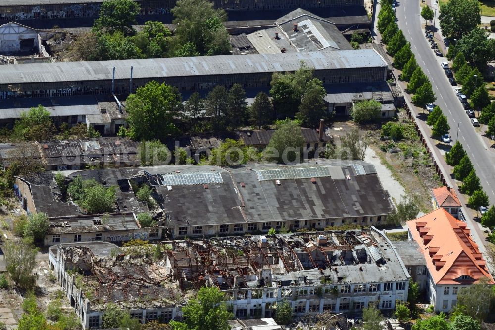 Aerial image Berlin - Fire Ruin the buildings and halls of formerly GDR- company VEB Kuehlautomat on Segelfliegerdonm in the district Johannisthal in Berlin, Germany