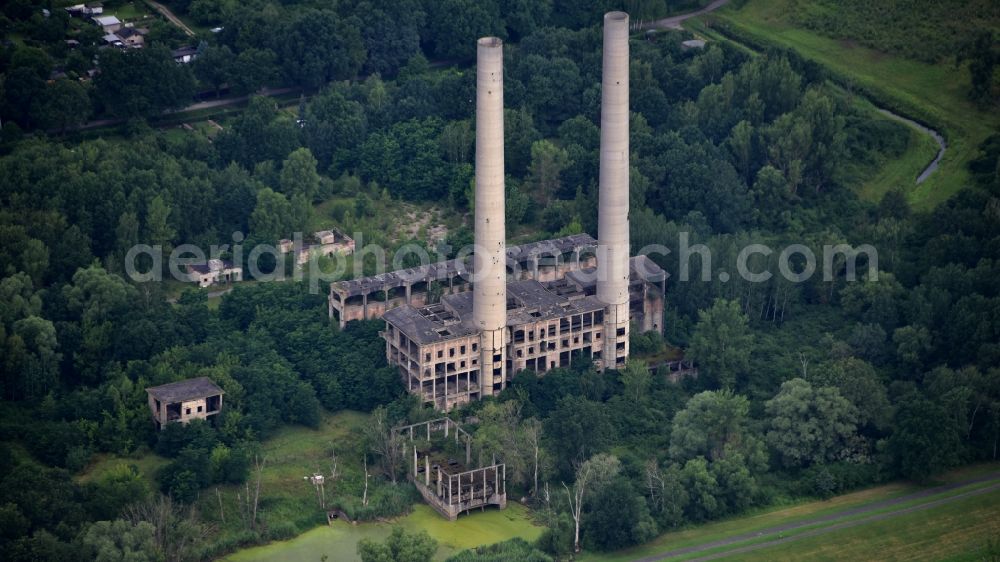 Eisenhüttenstadt from above - Building remains of the ruin of the disused HKW thermal power station and coal-fired power station Vogelsang - Wernerwerk in Eisenhuettenstadt in the state Brandenburg, Germany