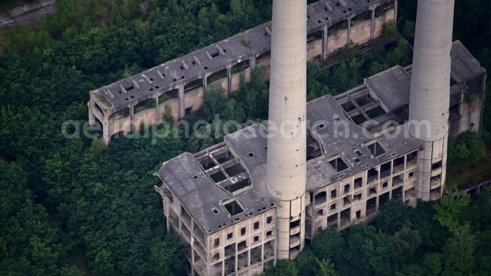 Eisenhüttenstadt from the bird's eye view: Building remains of the ruin of the disused HKW thermal power station and coal-fired power station Vogelsang - Wernerwerk in Eisenhuettenstadt in the state Brandenburg, Germany