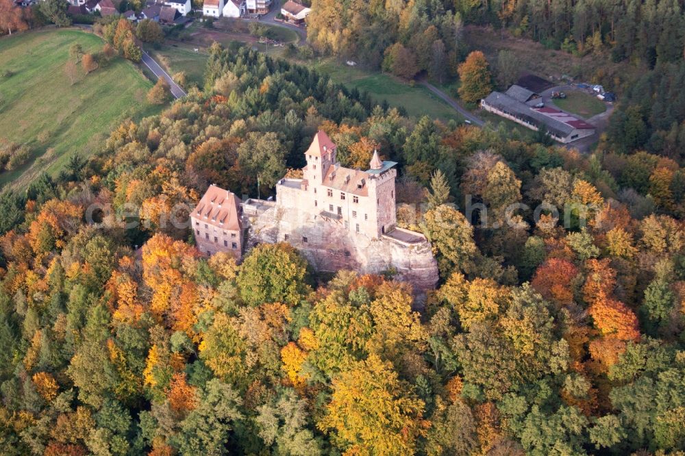 Erlenbach bei Dahn from above - Ruins and vestiges of the former castle and fortress Burg Berwartstein in autumn colured forest in Erlenbach bei Dahn in the state Rhineland-Palatinate