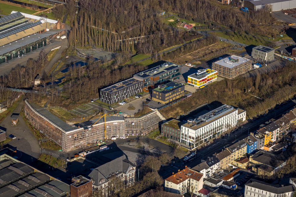 Aerial photograph Bochum - Ruins of the arched facade of the former entrance of the Krupp site in Bochum in North Rhine-Westphalia. The Colosseum is now part of West Park and is the southern boundary