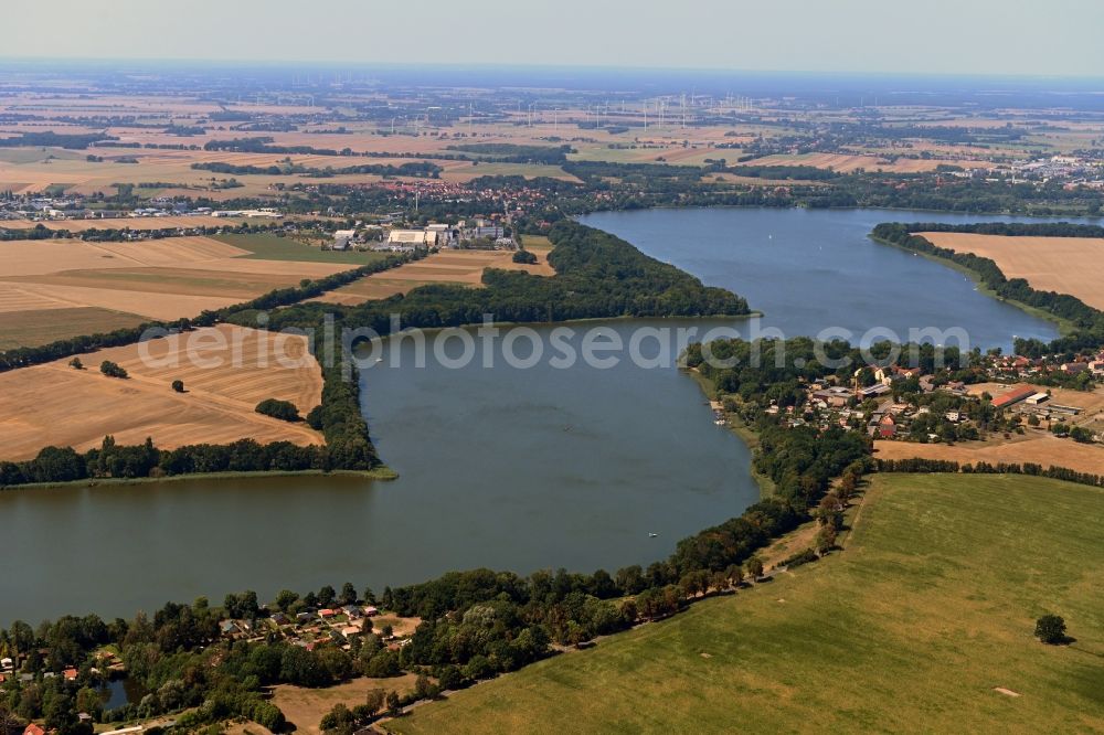 Gnewikow from the bird's eye view: Riparian areas on the lake area of Ruppiner See in Gnewikow in the state Brandenburg, Germany