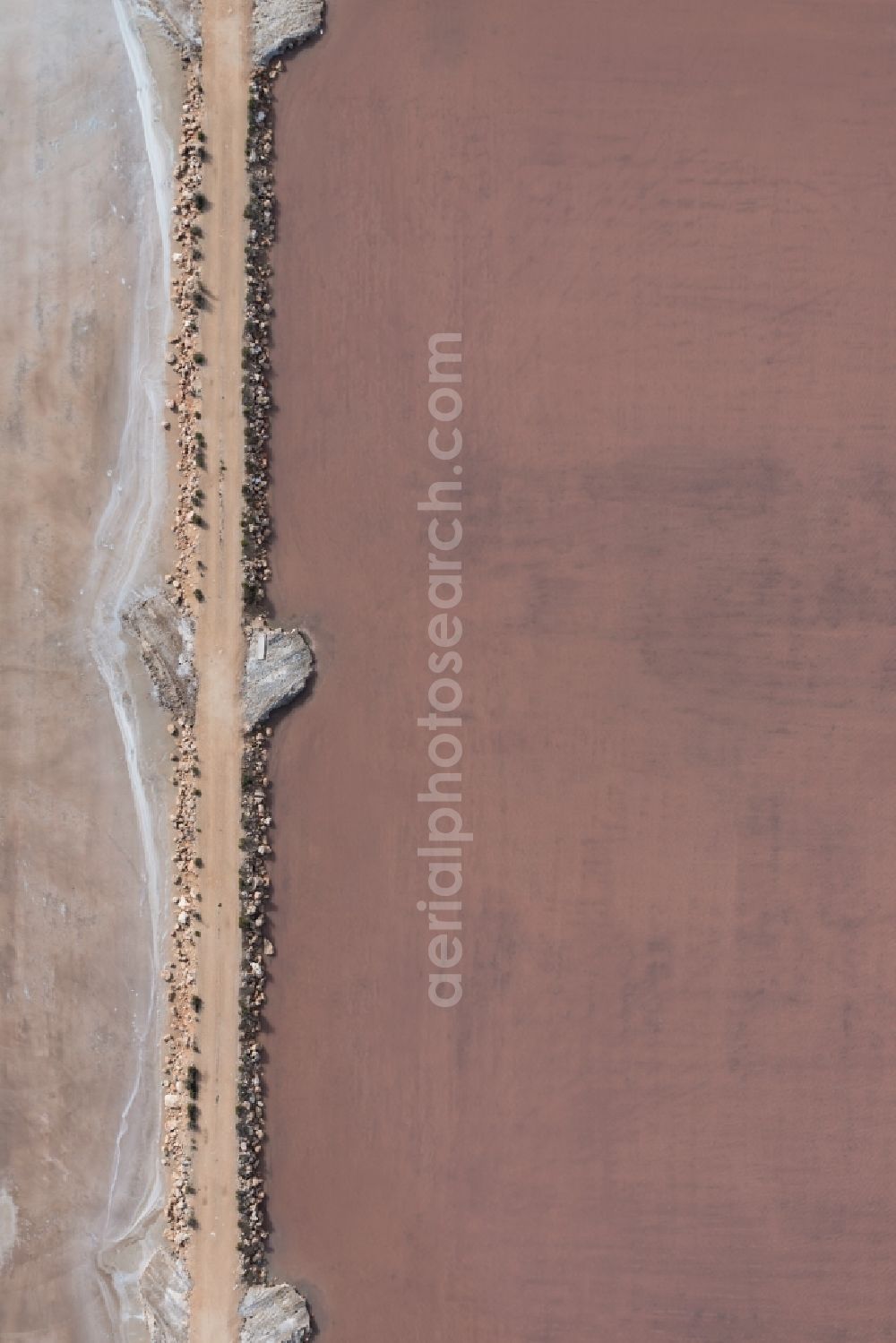 Aerial photograph Llucmajor - Brown - white salt pans for salt extraction in Llucmajor in Balearic Islands, Spain