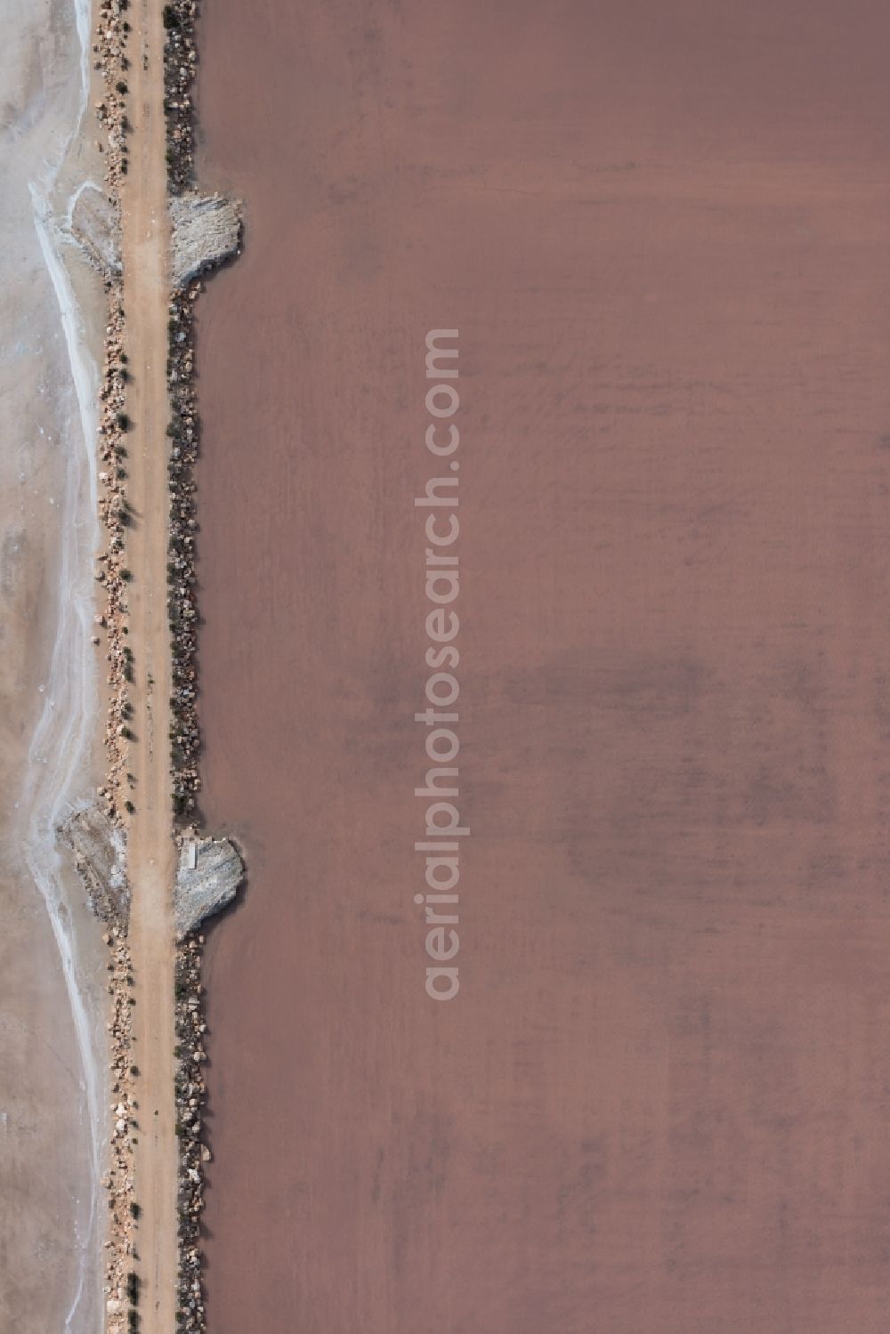 Llucmajor from above - Brown - white salt pans for salt extraction in Llucmajor in Balearic Islands, Spain