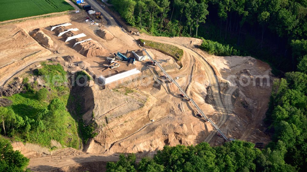Ockenfels from the bird's eye view: Sand and gravel mining in opencast mining in Ockenfels in the state Rhineland-Palatinate, Germany