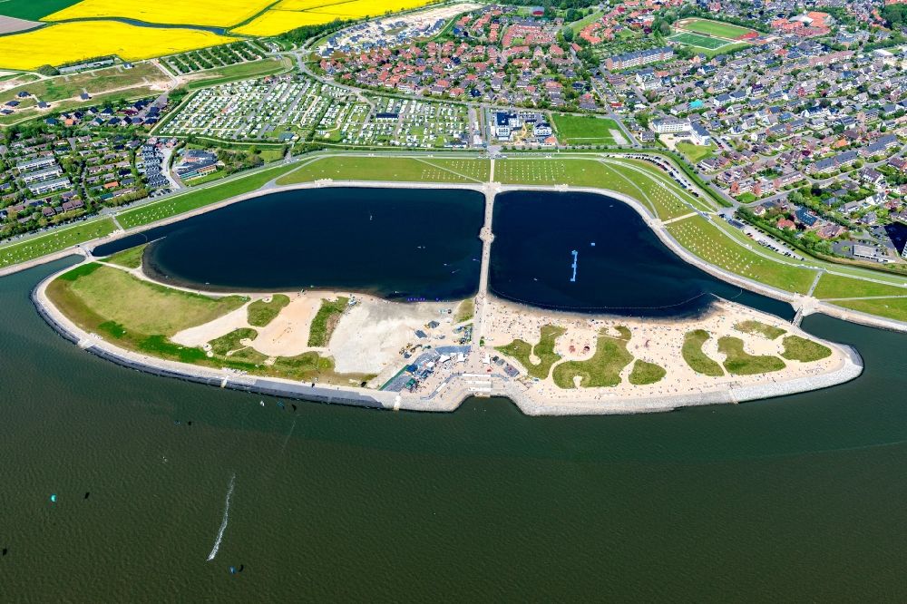 Büsum from above - Sandy beach in the coastal area of family lagoon pearl bay in the Wadden Sea in Buesum in Schleswig-Holstein
