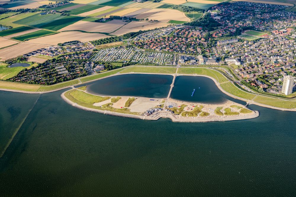 Büsum from above - Sandy beach in the coastal area of family lagoon pearl bay in the Wadden Sea in Buesum in Schleswig-Holstein