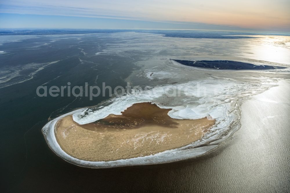 Schilling from above - Sandbank- land area by flow under the sea water surface of North Sea in Schilling in the state Lower Saxony, Germany