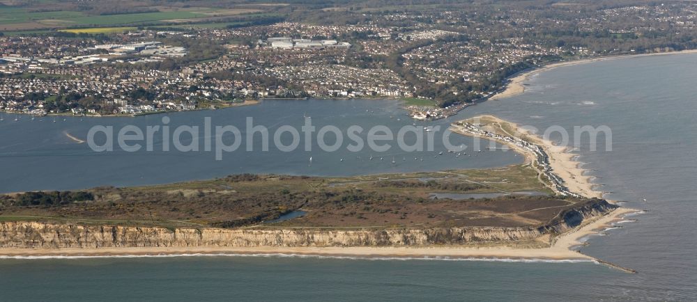 Bournemouth from the bird's eye view: Beach landscape Hengistbury Head an Christchurch Harbour along the English Channel in Bournemouth in England, United Kingdom