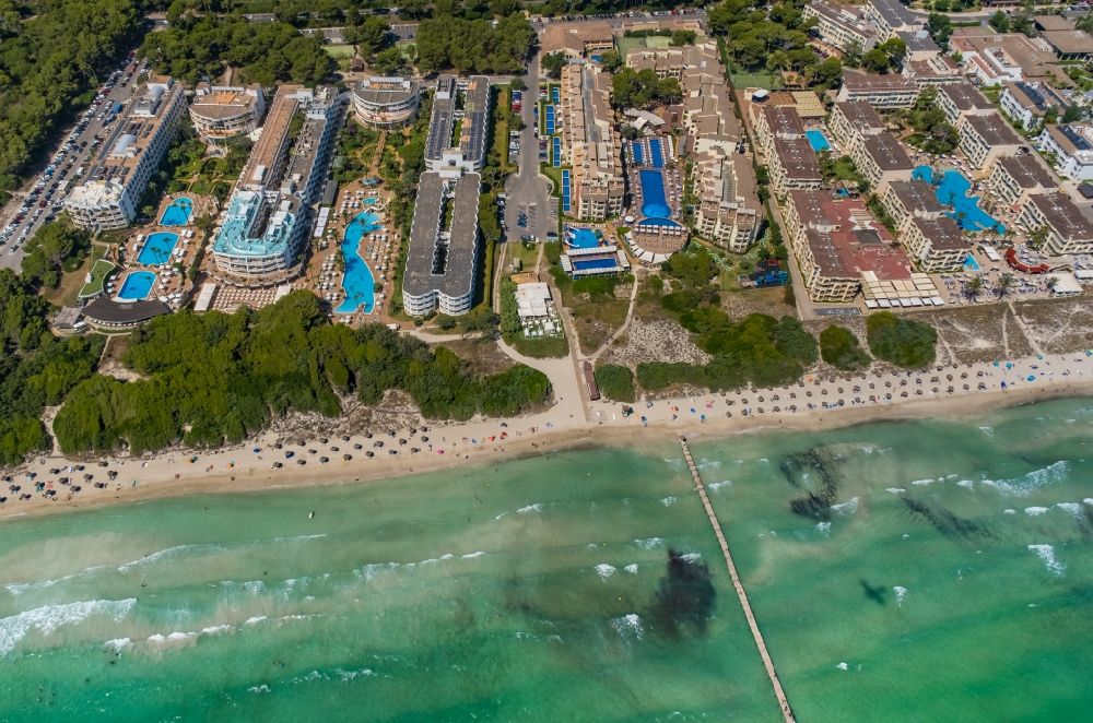 Can Picafort from above - Beach landscape along the coast line with the hotels Iberostar Albufera Park and Iberostar Albufera Playa on Carrer Dunes in Can Picafort in Balearic island of Mallorca, Spain