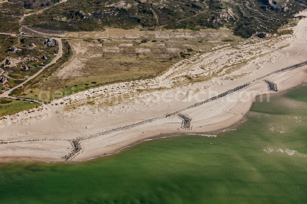Hörnum (Sylt) from the bird's eye view: Beach landscape along the at the North Sea in Hoernum (Sylt) in the state Schleswig-Holstein, Germany