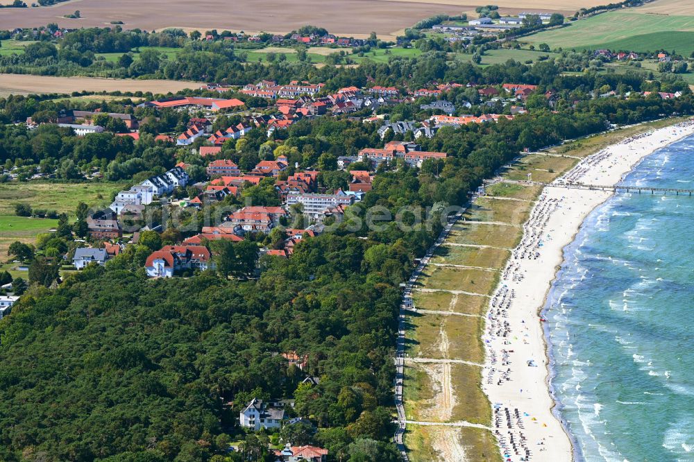Aerial image Ostseebad Boltenhagen - Beach landscape along the of Baltic Sea on street Ostseeallee in Ostseebad Boltenhagen at the baltic sea coast in the state Mecklenburg - Western Pomerania, Germany