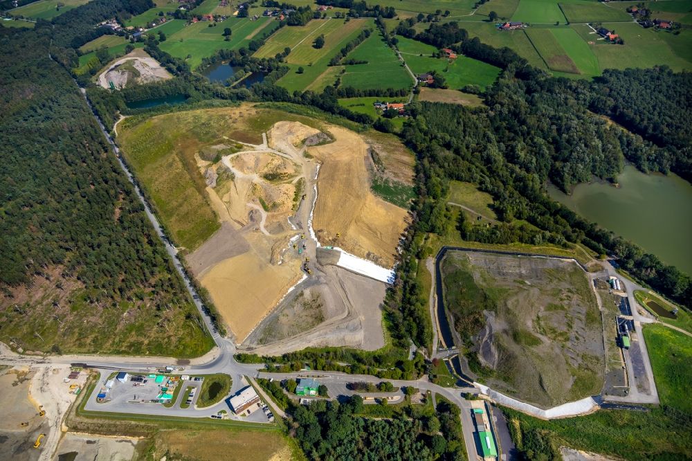 Aerial photograph Hünxe - Renovation, sealing and restoration work on the site of the refurbished landfill in Huenxe in the state North Rhine-Westphalia, Germany