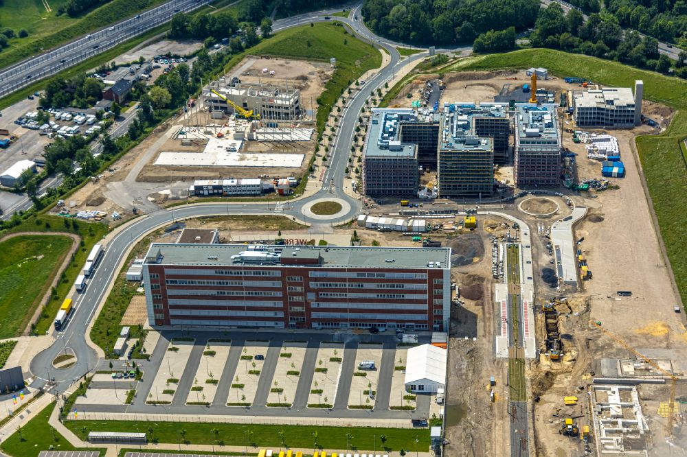 Aerial photograph Bochum - Construction site to build a new office and commercial building O-Werk and construction of the new road on Opelring overlooking the other construction sites in the development area MARK 51A?7 in Bochum in the state North Rhine-Westphalia, Germany