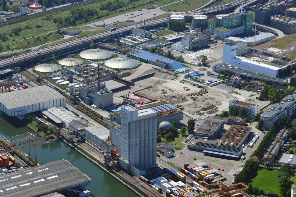 Basel from the bird's eye view: New construction site and extension of the sewage treatment basins and purification stages of the plant of ProRheno in the district Kleinhueningen in Basel, Switzerland