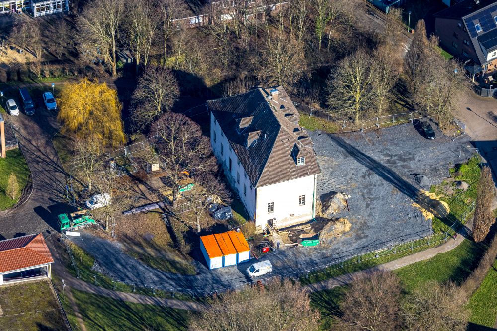 Selm from the bird's eye view: Construction site for reconstruction and modernization and renovation of a building Burg Botzler on the Teichstrasse in Selm in the state North Rhine-Westphalia, Germany
