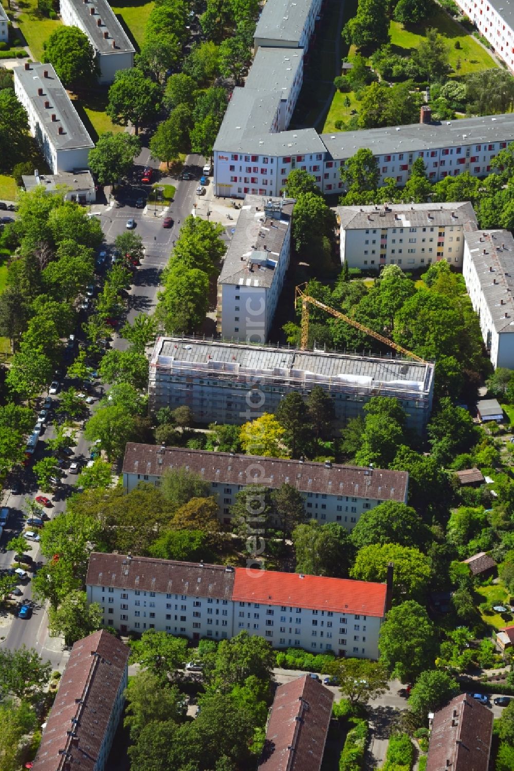 Berlin from above - Construction site for reconstruction and modernization and renovation of a building Terraced house on Rixdorfer Strasse in the district Mariendorf in Berlin, Germany